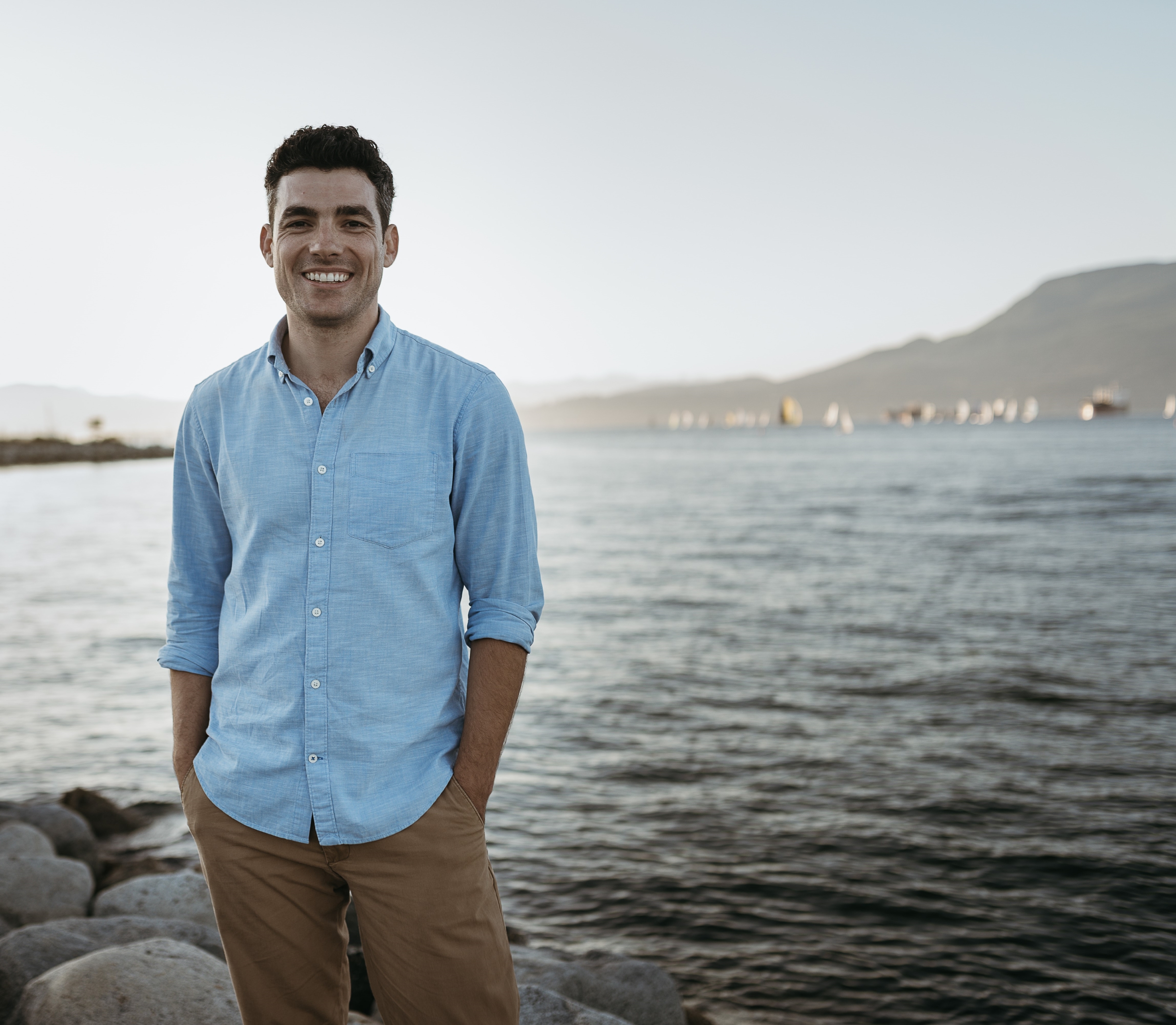 Sam Melamed standing by the water